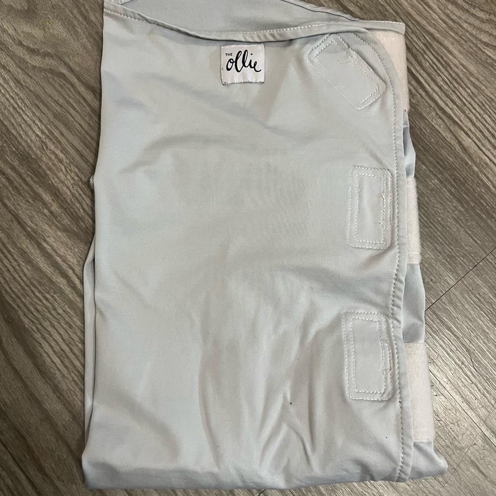 Ollie Swaddle Infant Sleep Sack; Temperature regulating material Grows with baby